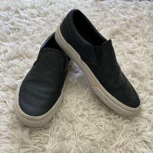 black leather slip on vans